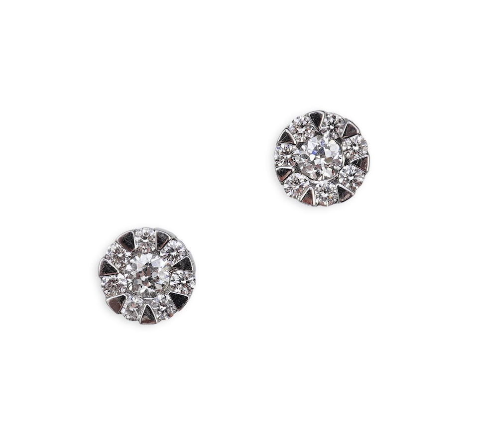 A pair of diamond stud earrings
